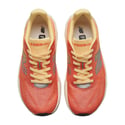 Ténis New Balance FuelCell Rebel v5 Laranja Amarelo SS26 Feminino