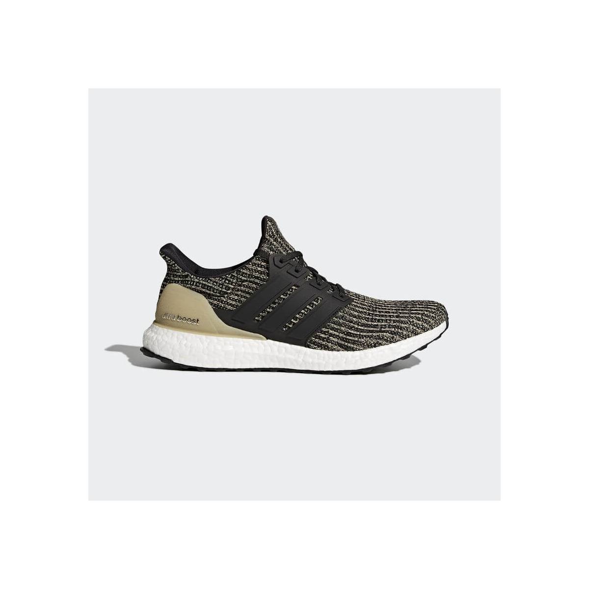 Adidas ultra boost core black raw gold top