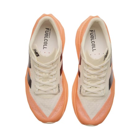 Chaussures New Balance FuelCell Rebel v4 orange blanc SS25